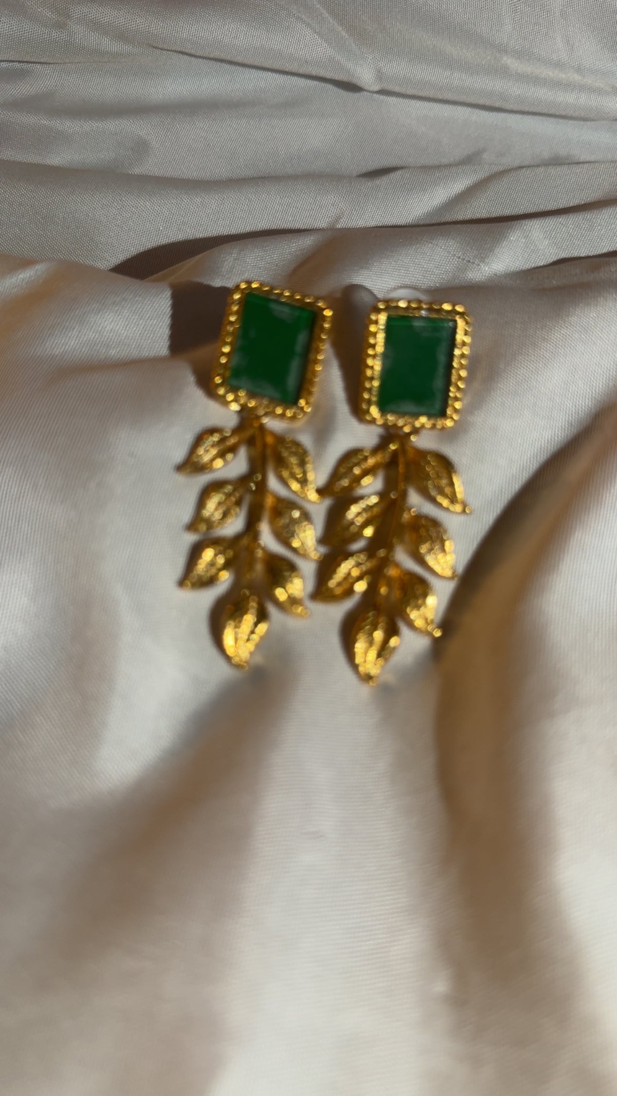 Emerald gold, tone earring